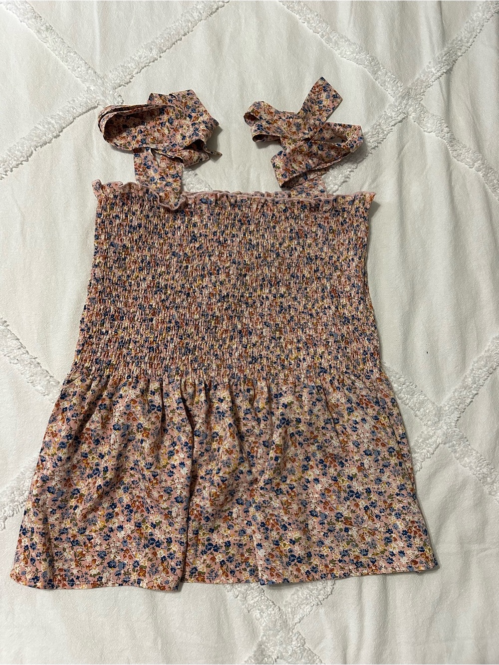 Floral Smocked Tie-Shoulder shirt.